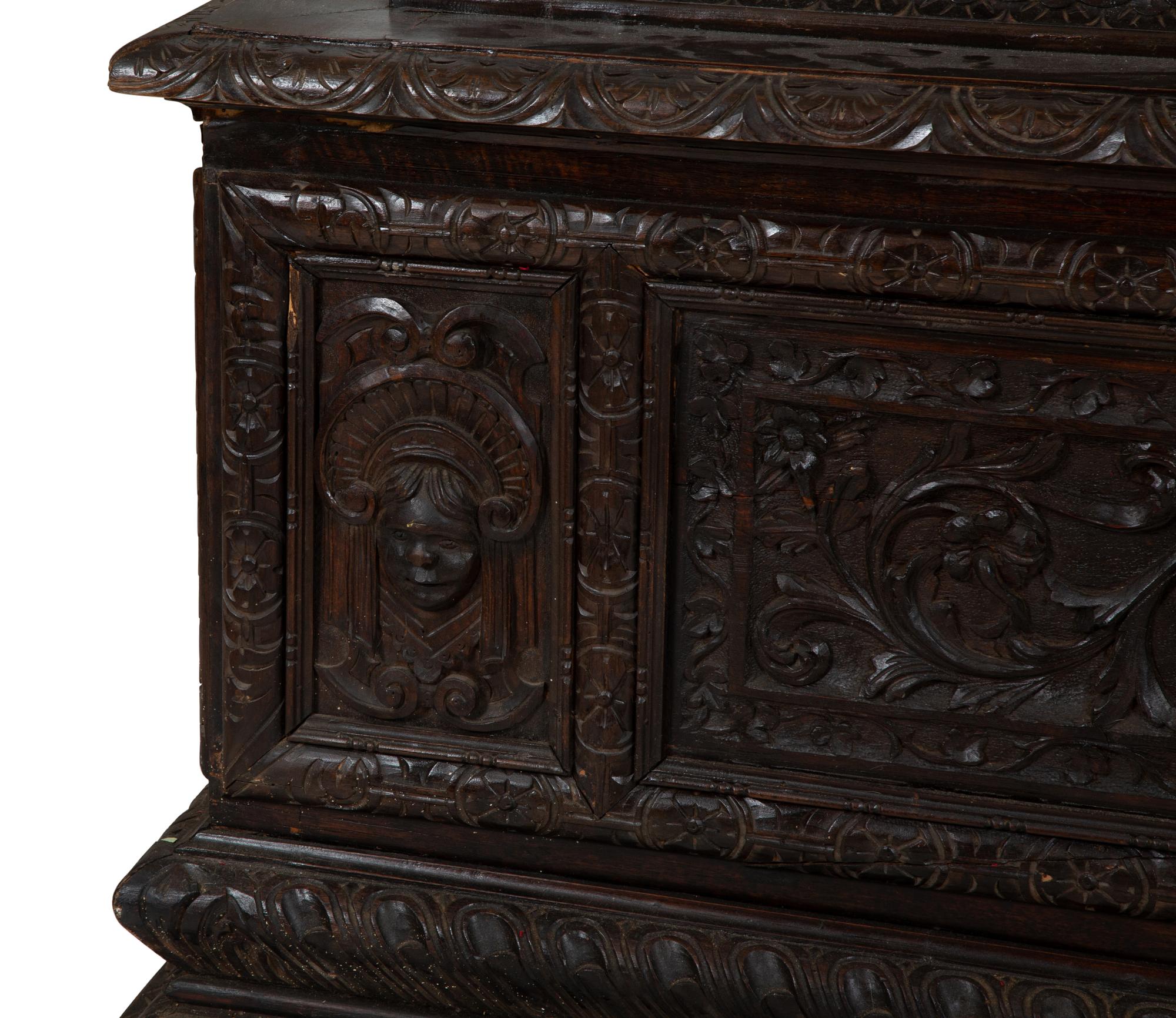 An Italian Renaissance Revival Carved Oak Cassone