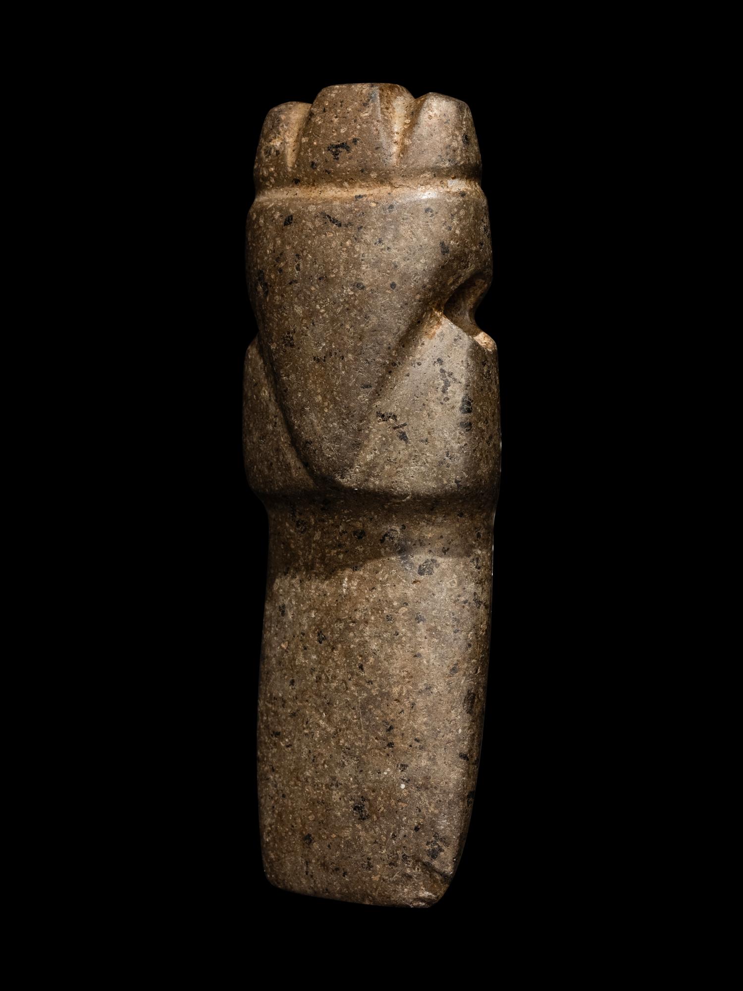A Nicoya Stone Avian Axe Pendant