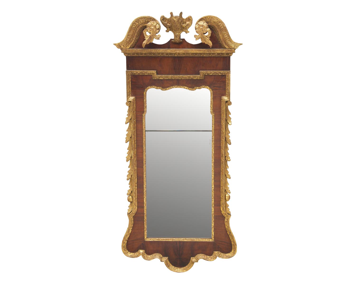 A George III Mahogany Veneered and Parcel-Gilt Looking Glass