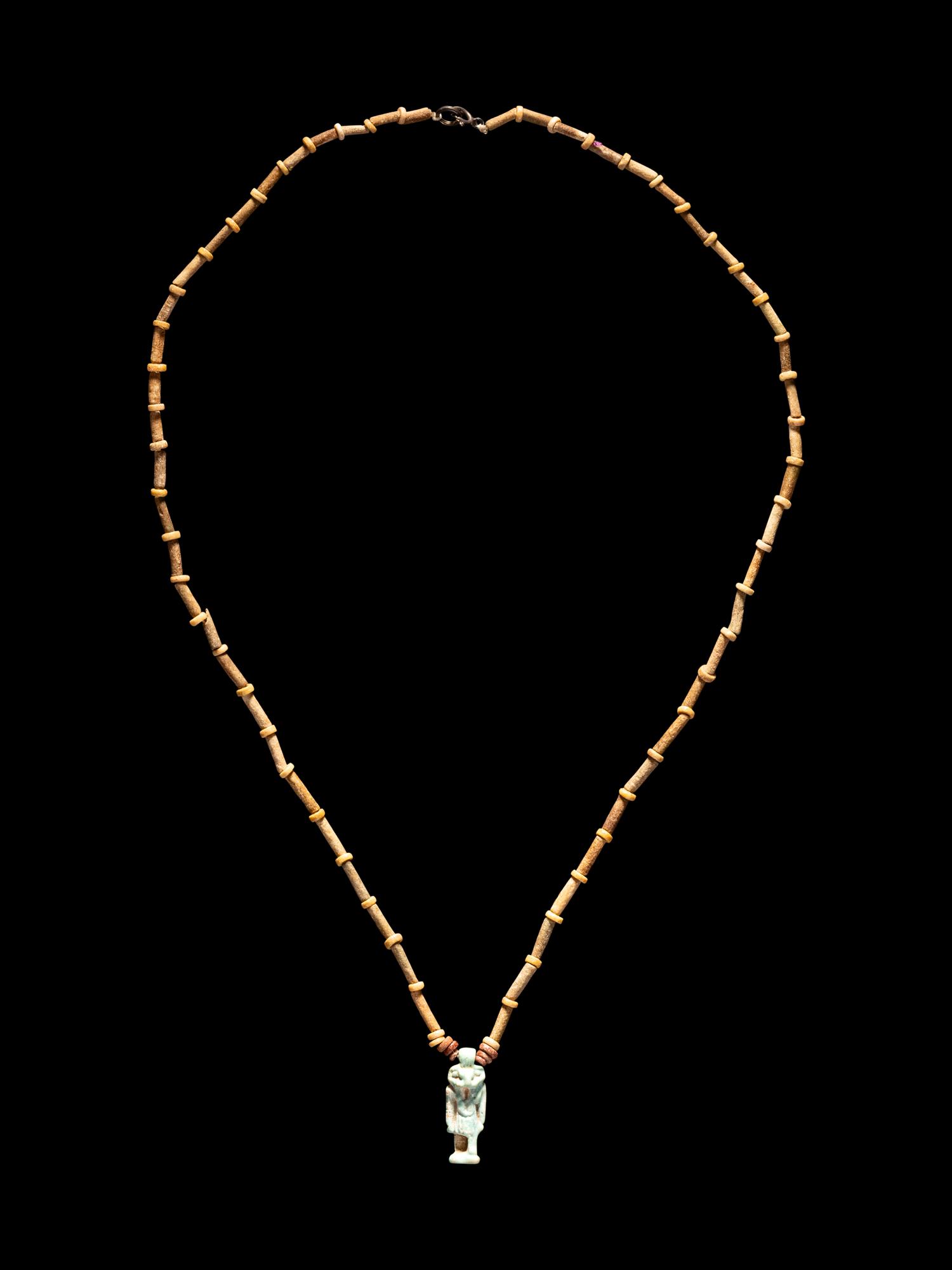 An Egyptian Bead and Faience Necklace with Khnum