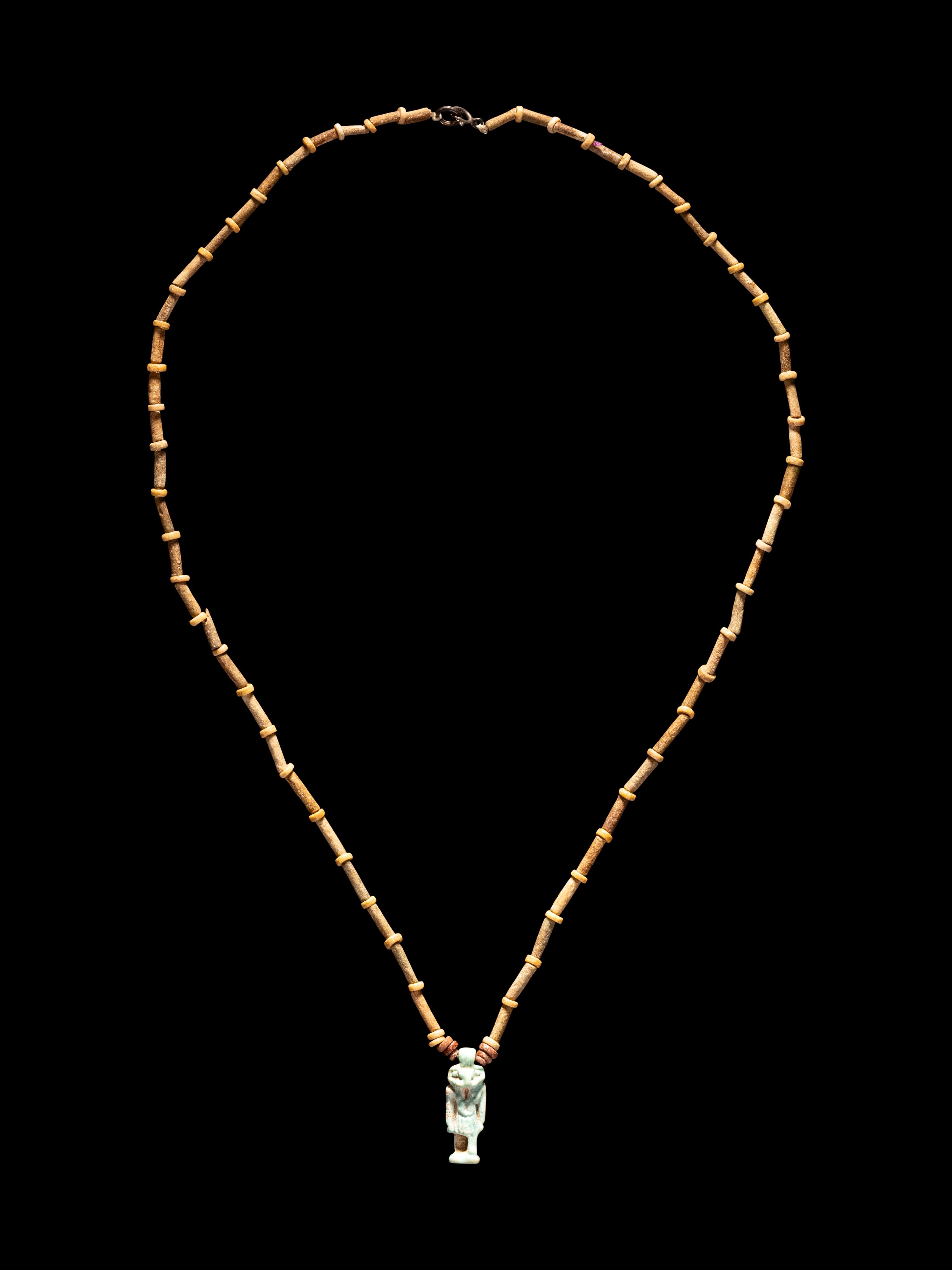 An Egyptian Bead and Faience Necklace with Khnum