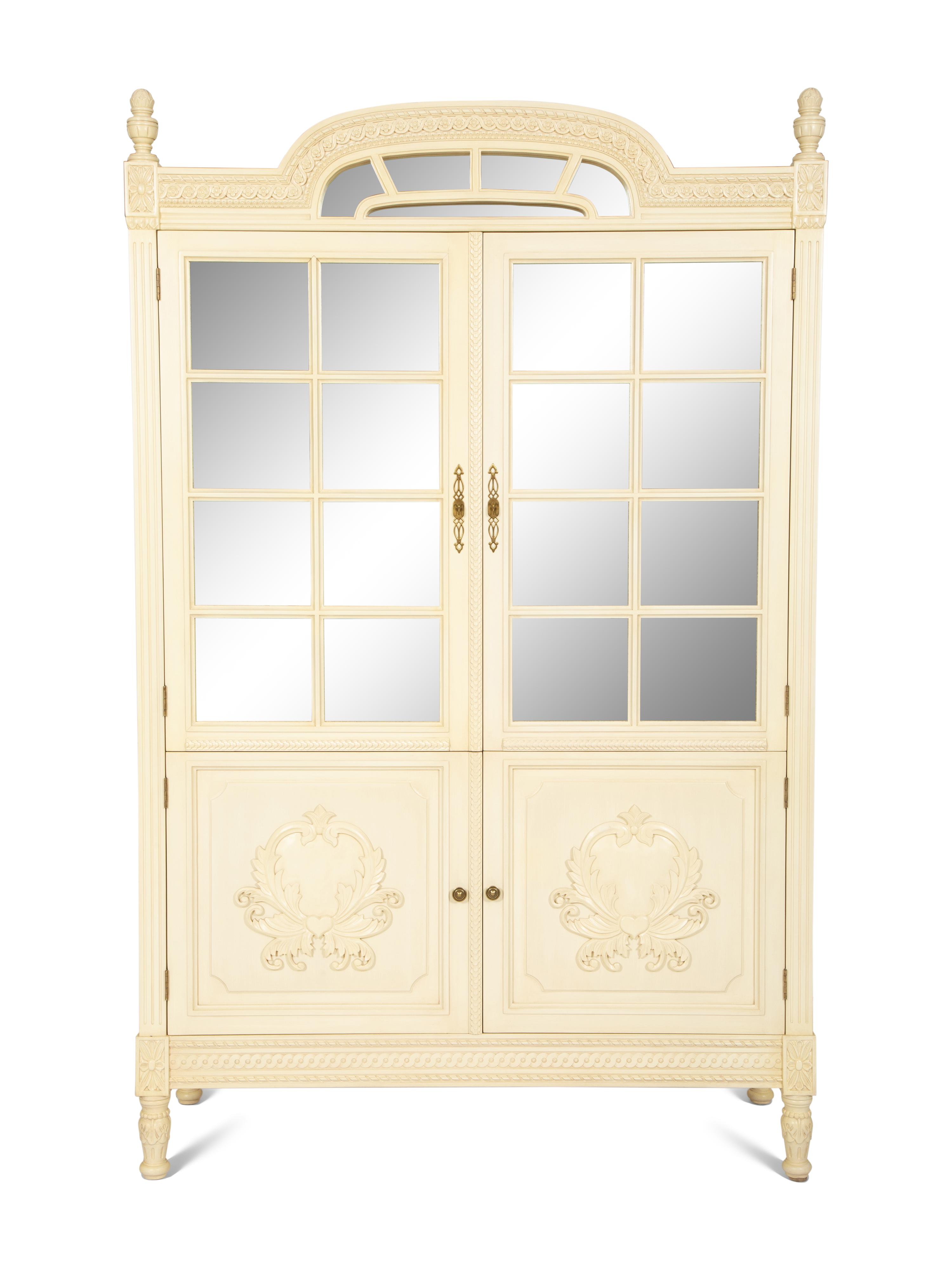 A Louis XVI Style White Painted Four-Door Armoire by Julia Gray, New York