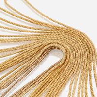 A collection of eleven fourteen karat gold necklaces