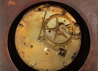 A Louis Philippe Gilt and Patinated Bronze Figural Mantel Clock