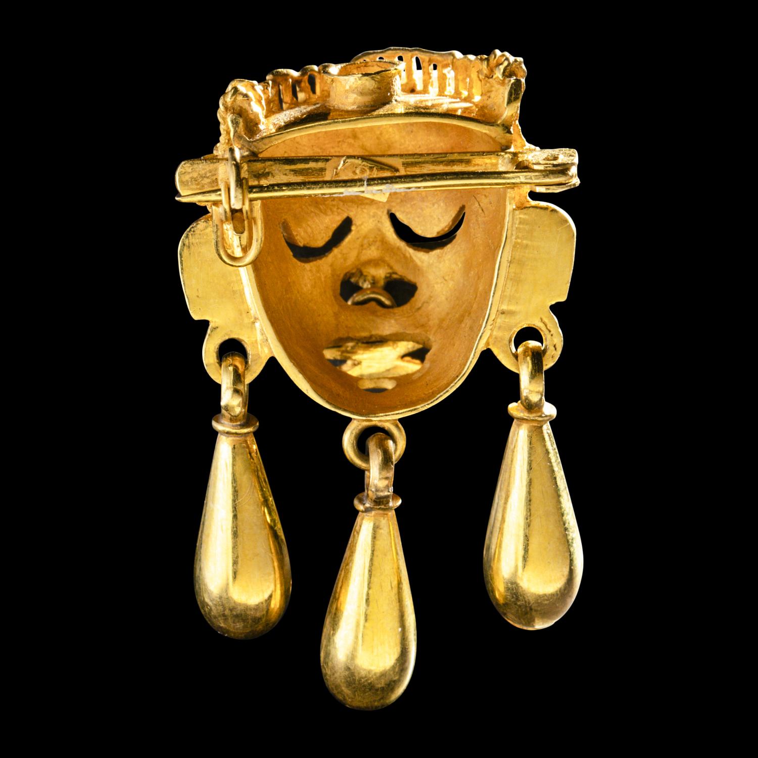 A Coclé Tumbaga Face Pendant