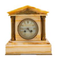 A Gilt-Metal Mounted Onyx Mantel Clock