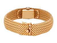 MOVADO, 14K YELLOW GOLD, DIAMOND AND SAPPHIRE SURPRISE WRISTWATCH