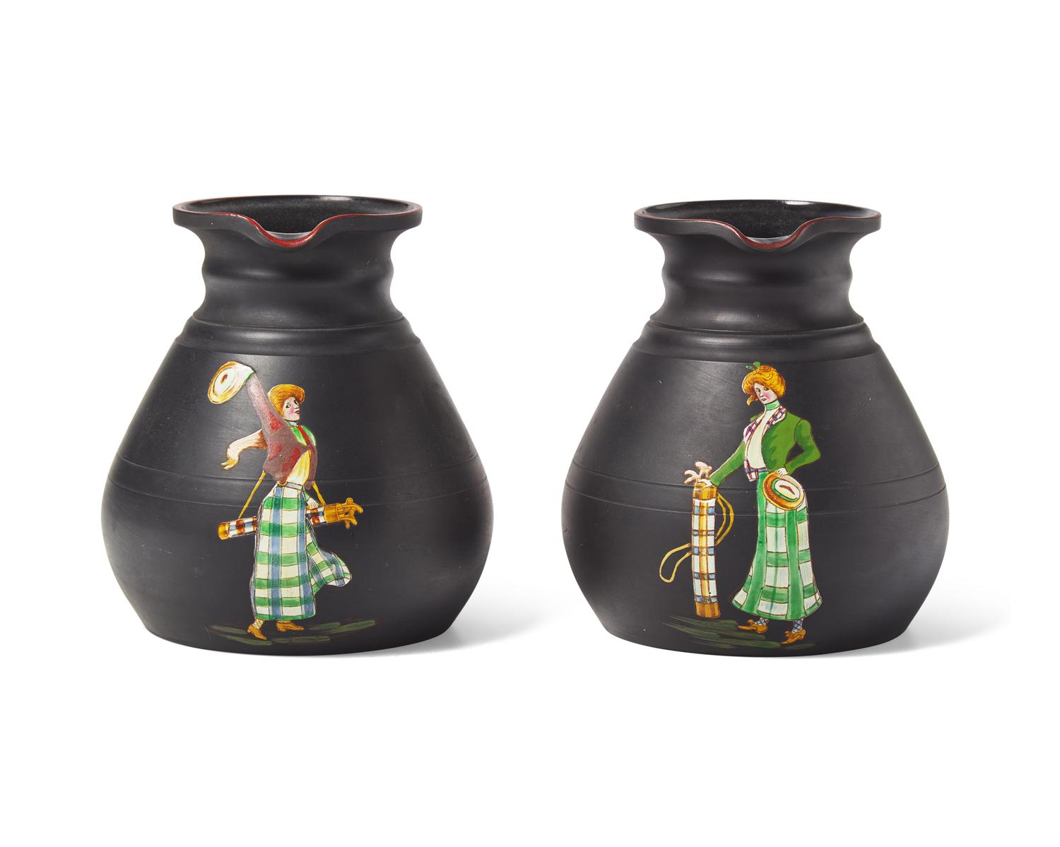 A Pair of Wedgwood Black Basalt "Golf Girls" Decorated Kenlockware Jugs