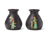 A Pair of Wedgwood Black Basalt "Golf Girls" Decorated Kenlockware Jugs