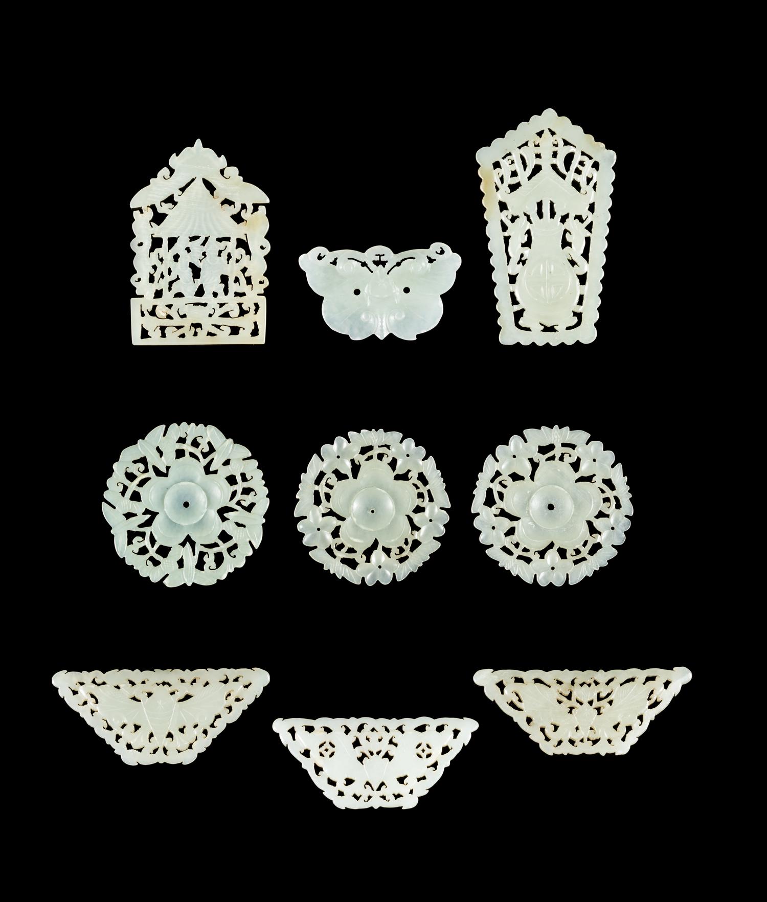Nine Chinese Carved Celadon Jade Pendants