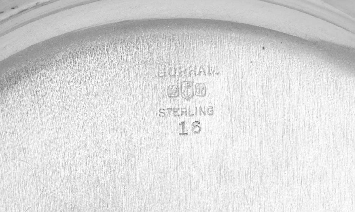 A Set of Eleven American Silver Bread Plates