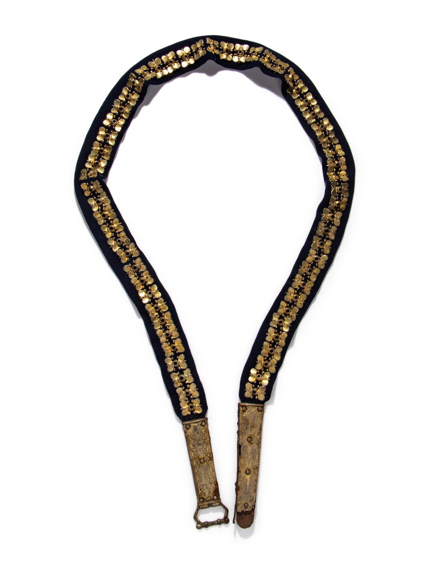 A Carolingian Gilt-Silver Belt with Buckle, Clasp, and 62 Fittings