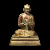 A Gilt Repousse Copper Alloy Figure of a Seated Monk, Probably Dolonor, Inner Mongolia, 18th/19th Century 清中期 銅鎏金上師坐像