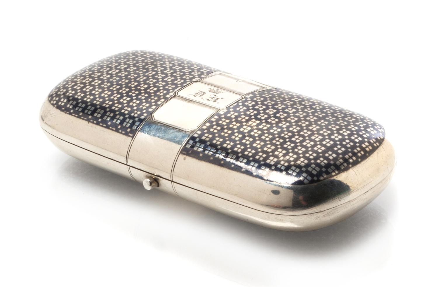 A Russian Niello Silver Cigarette Case, Maker's mark obscured, assay mark of A. Schechin, Moscow, 1864, the case with a niello decorate