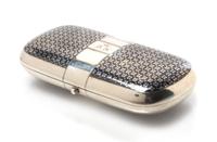 A Russian Niello Silver Cigarette Case, Maker's mark obscured, assay mark of A. Schechin, Moscow, 1864, the case with a niello decorate