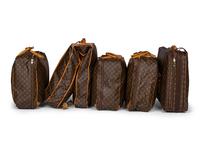 A Group of Five Louis Vuitton Travel Articles