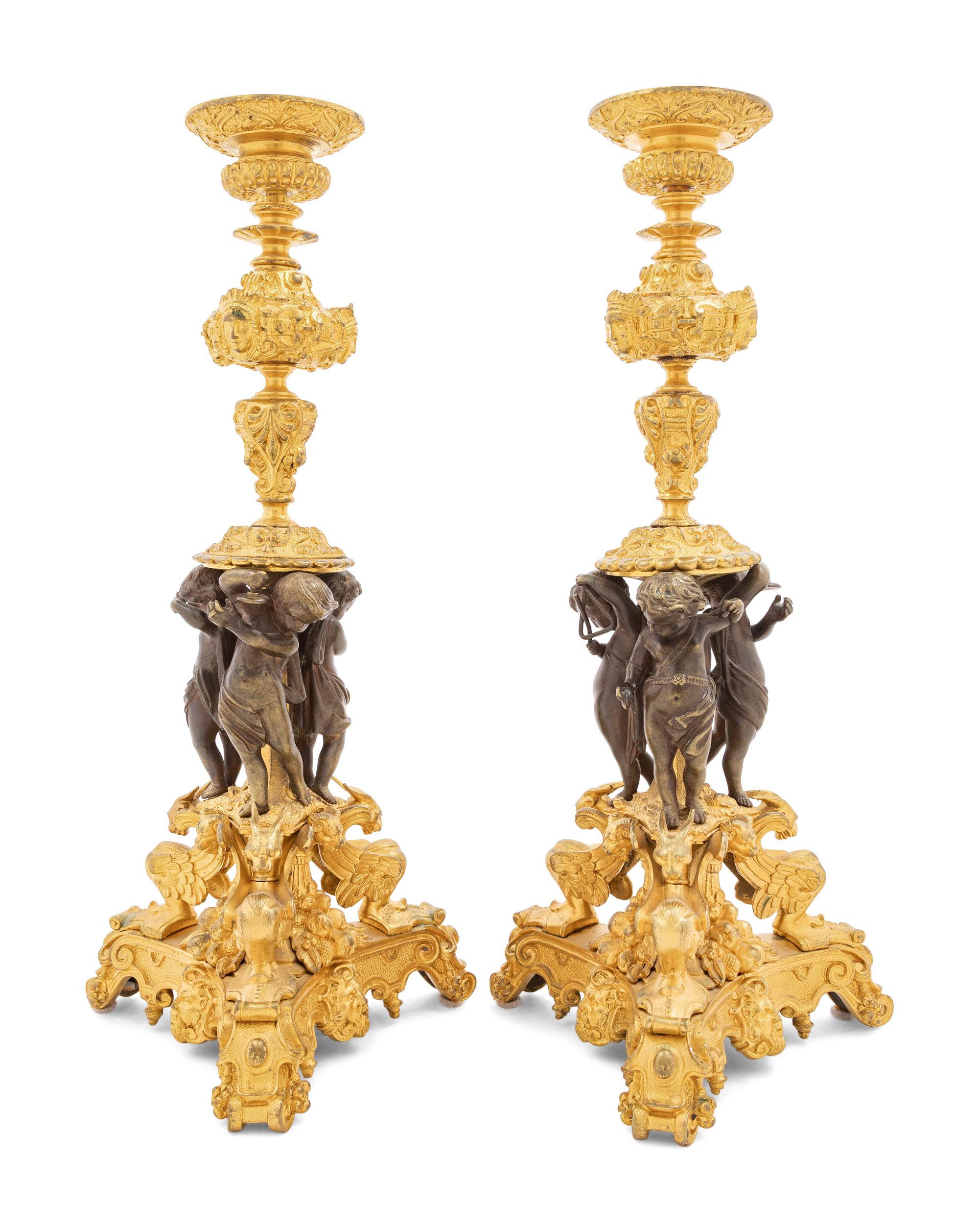 A Pair of French Bronze Candlesticks