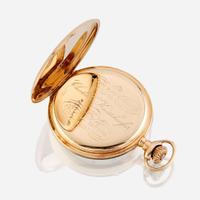 A fourteen karat gold open face pocket watch, Waltham, retailed by J.E. Caldwell