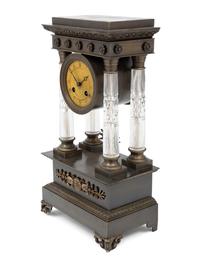 An Empire Style Bronze and Cut Glass Mantel Clock