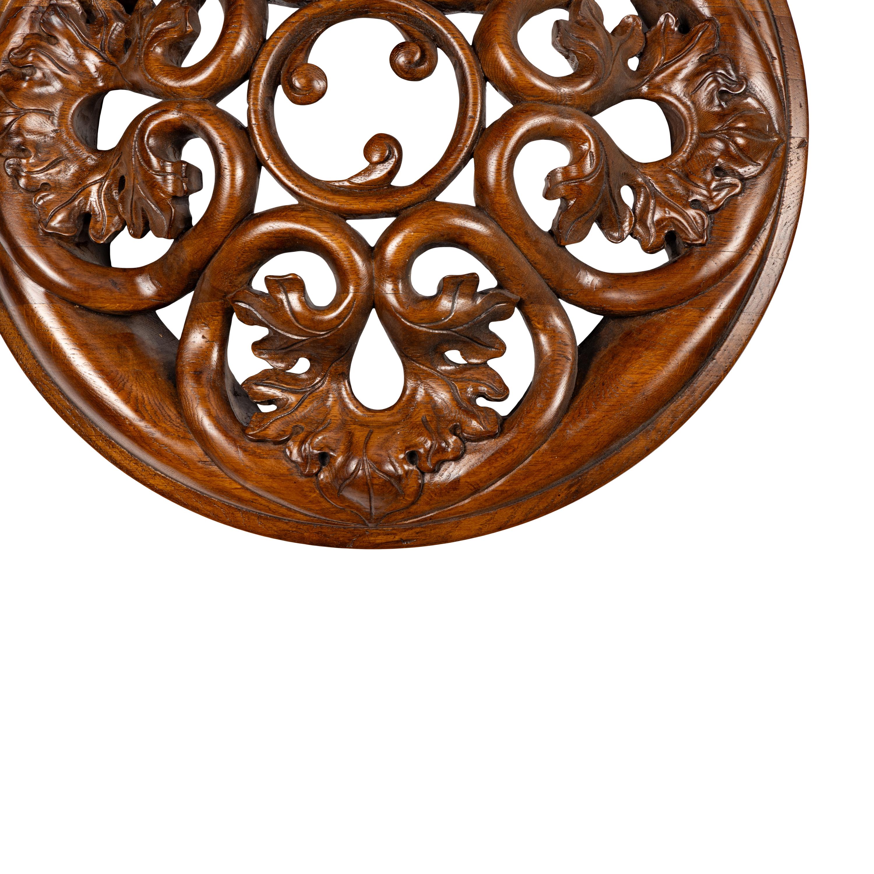 A Pair of Gothic Style Carved Oak Roundels