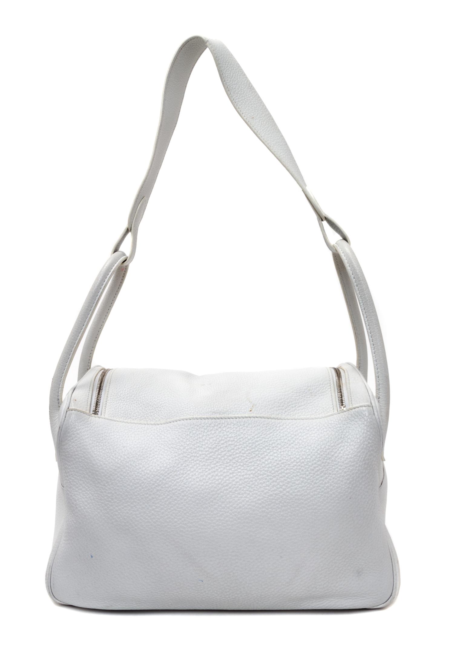 An Hermes White Taurillon Clemence Lindy 34 Handbag, 13.5" x 8" x 7".