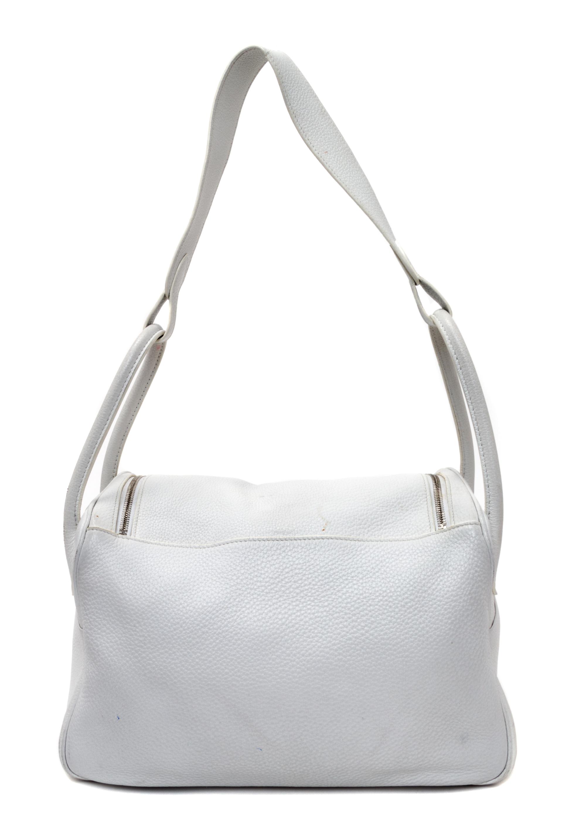 An Hermes White Taurillon Clemence Lindy 34 Handbag, 13.5" x 8" x 7".
