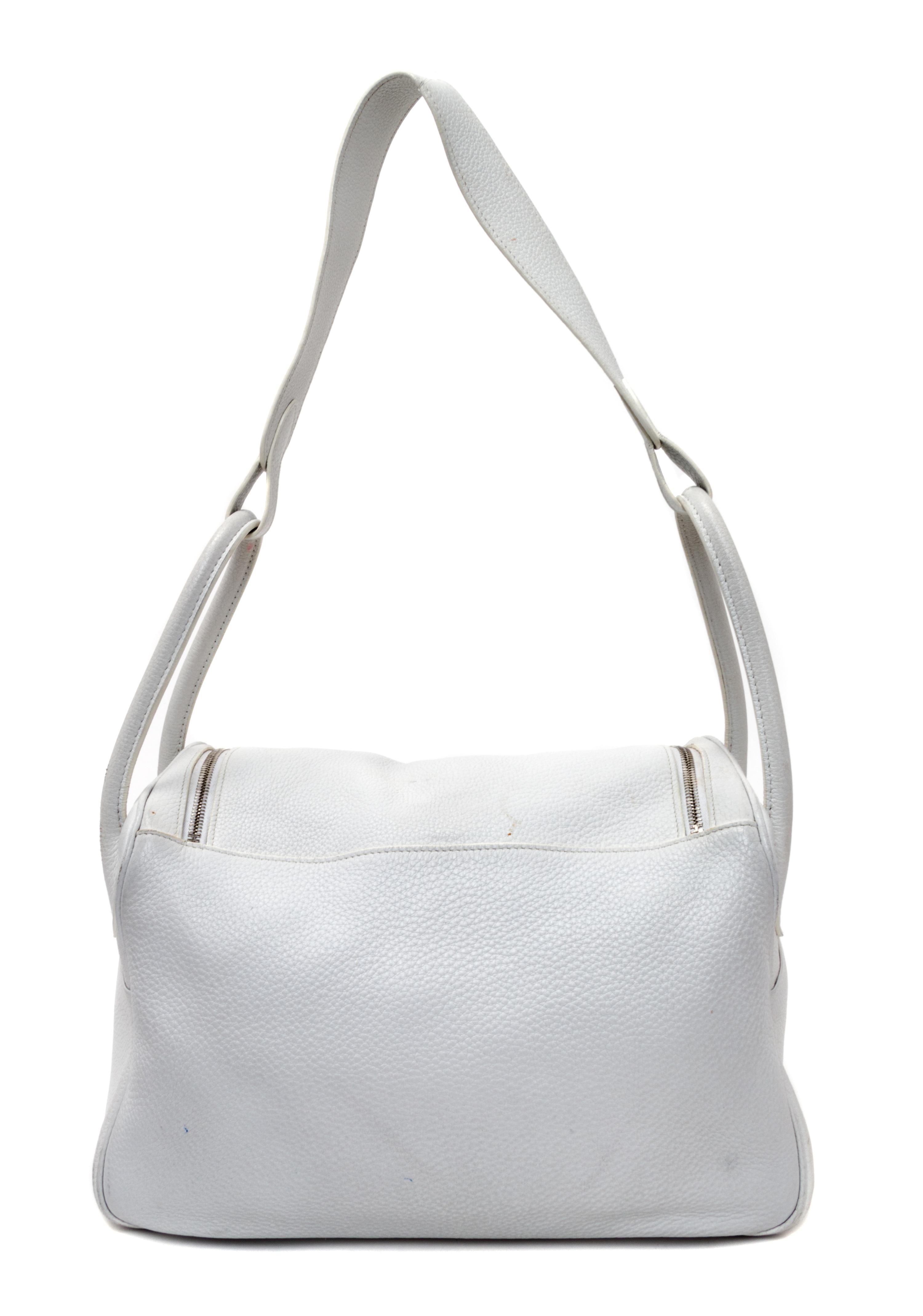 An Hermes White Taurillon Clemence Lindy 34 Handbag, 13.5" x 8" x 7".