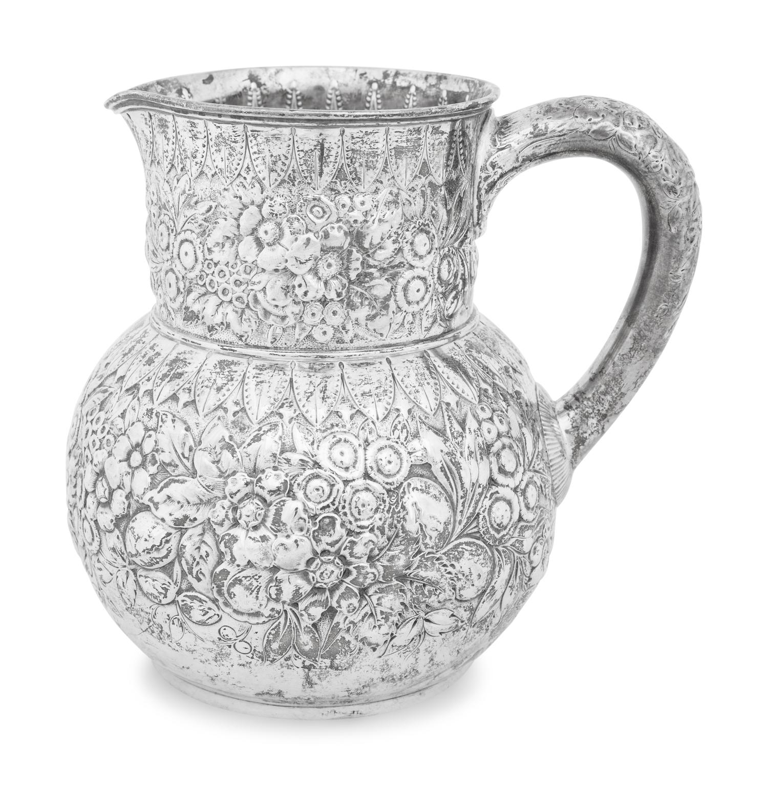 A Tiffany and Co. Silver Repousse Water Pitcher