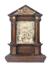 A Carved Stone Relief Panel Set in a Carved Oak and Parcel Gilt Frame