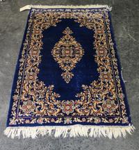 A Persian Wool Rug 4 feet 7 inches x 2 feet 10 inches. — MID 20TH CENTURY