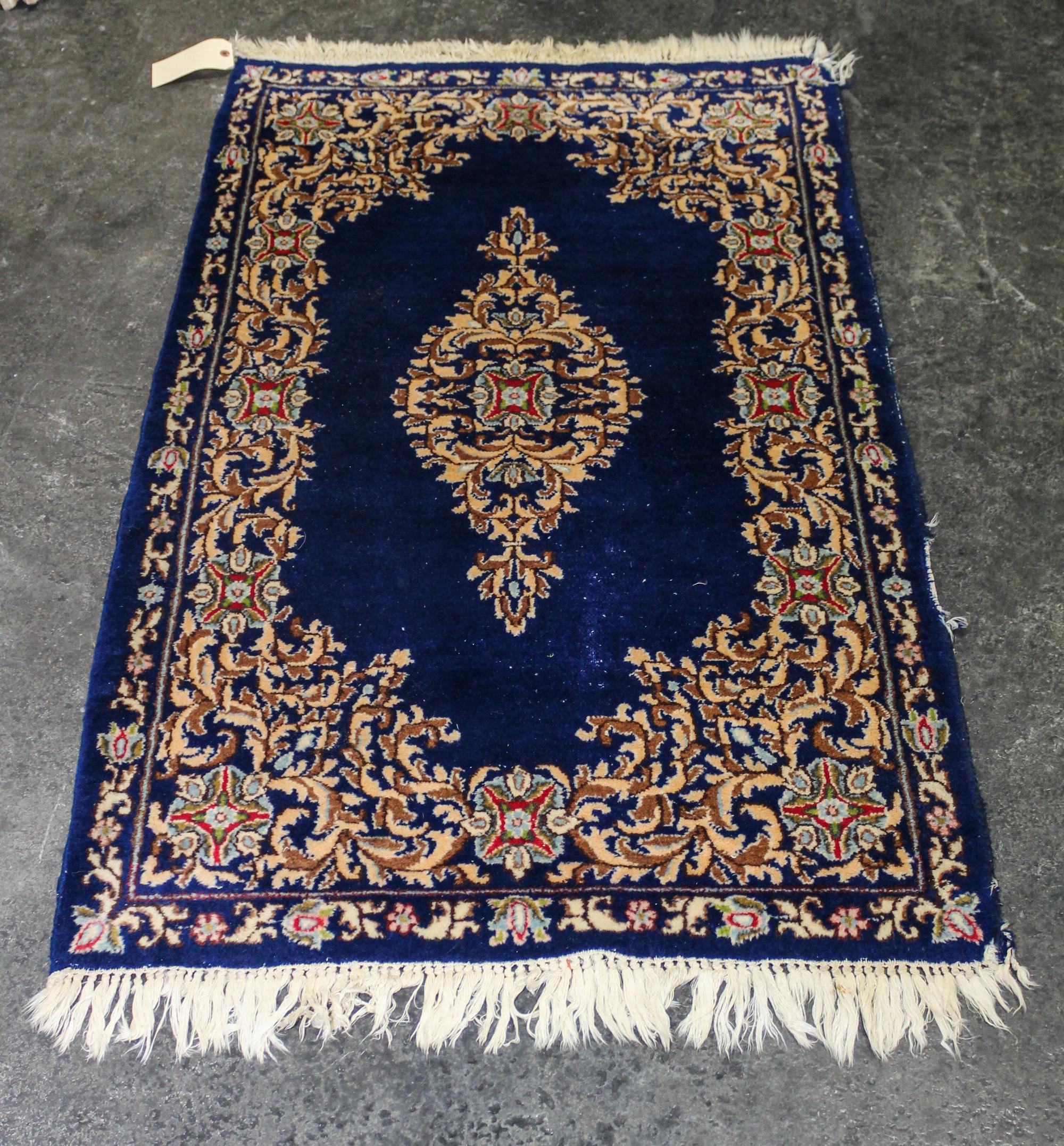 A Persian Wool Rug 4 feet 7 inches x 2 feet 10 inches. — MID 20TH CENTURY