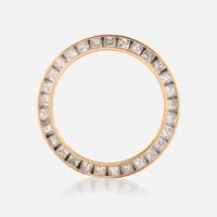 An eighteen karat gold and diamond watch bezel
