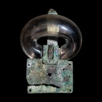 A Merovingian Bronze, Rock Crystal, and Garnet Belt Buckle