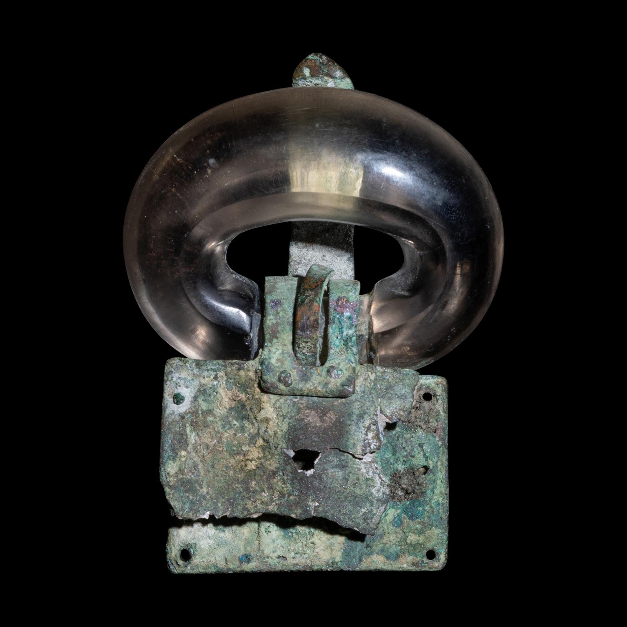 A Merovingian Bronze, Rock Crystal, and Garnet Belt Buckle
