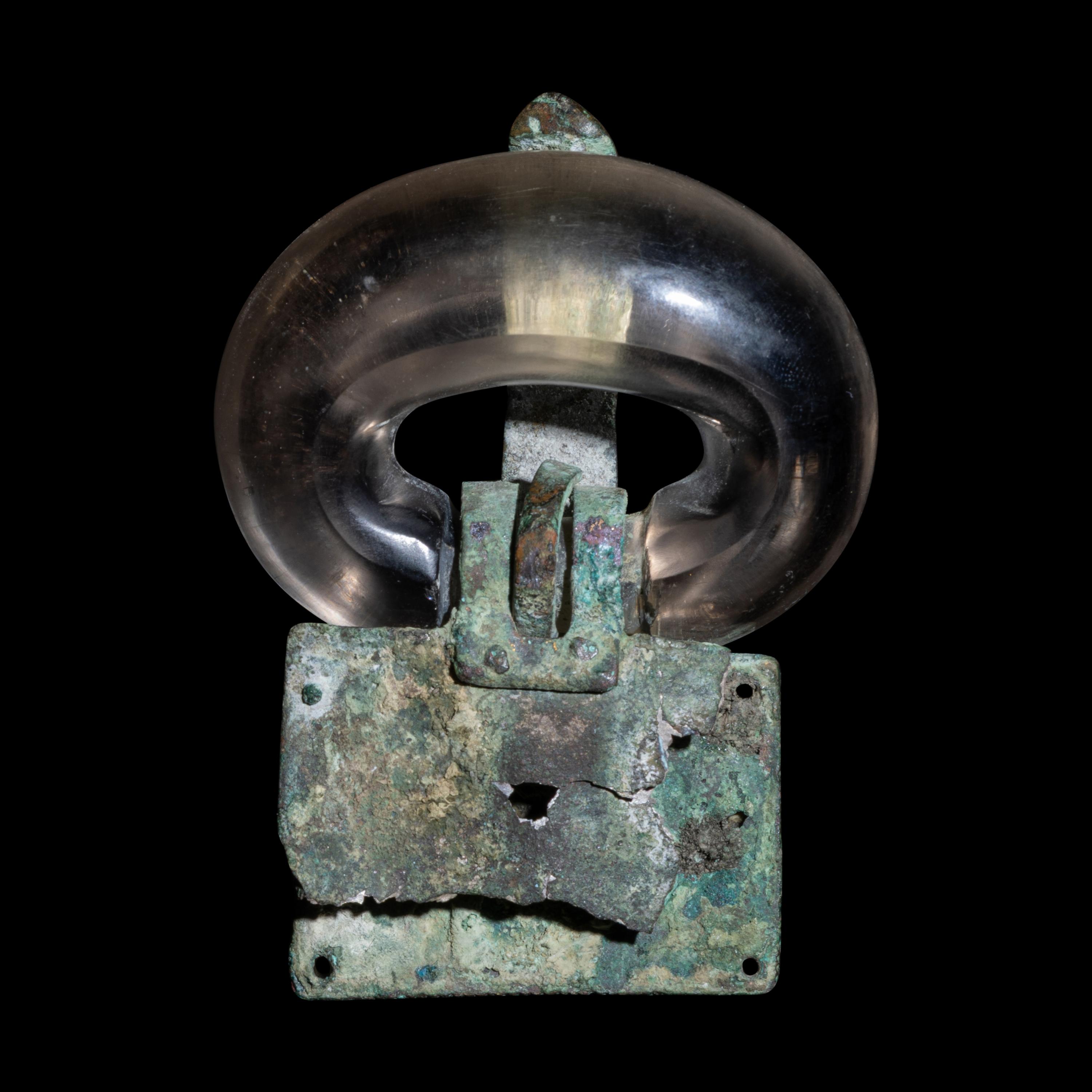 A Merovingian Bronze, Rock Crystal, and Garnet Belt Buckle