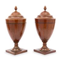 A Pair of George III Mahogany Urns