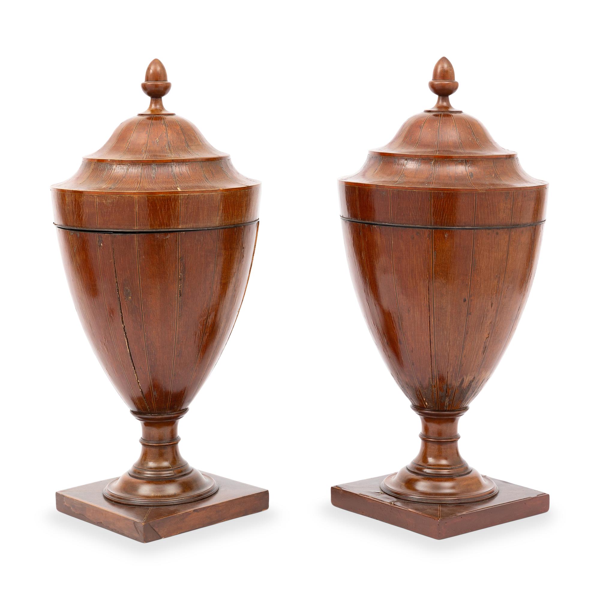 A Pair of George III Mahogany Urns