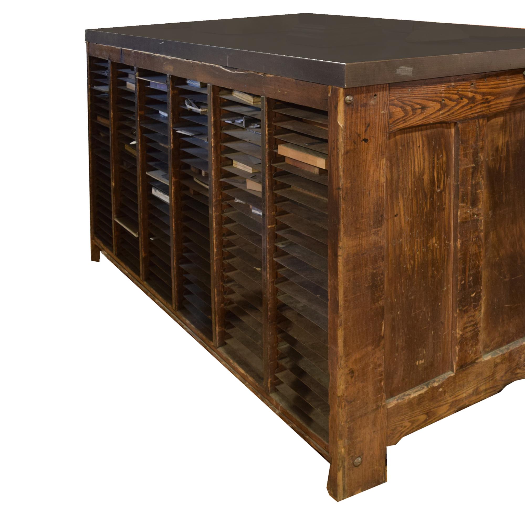 An Oak and Steel Printer's Cabinet 65" W x 39" D x 38.5" H — United States, 20th Century