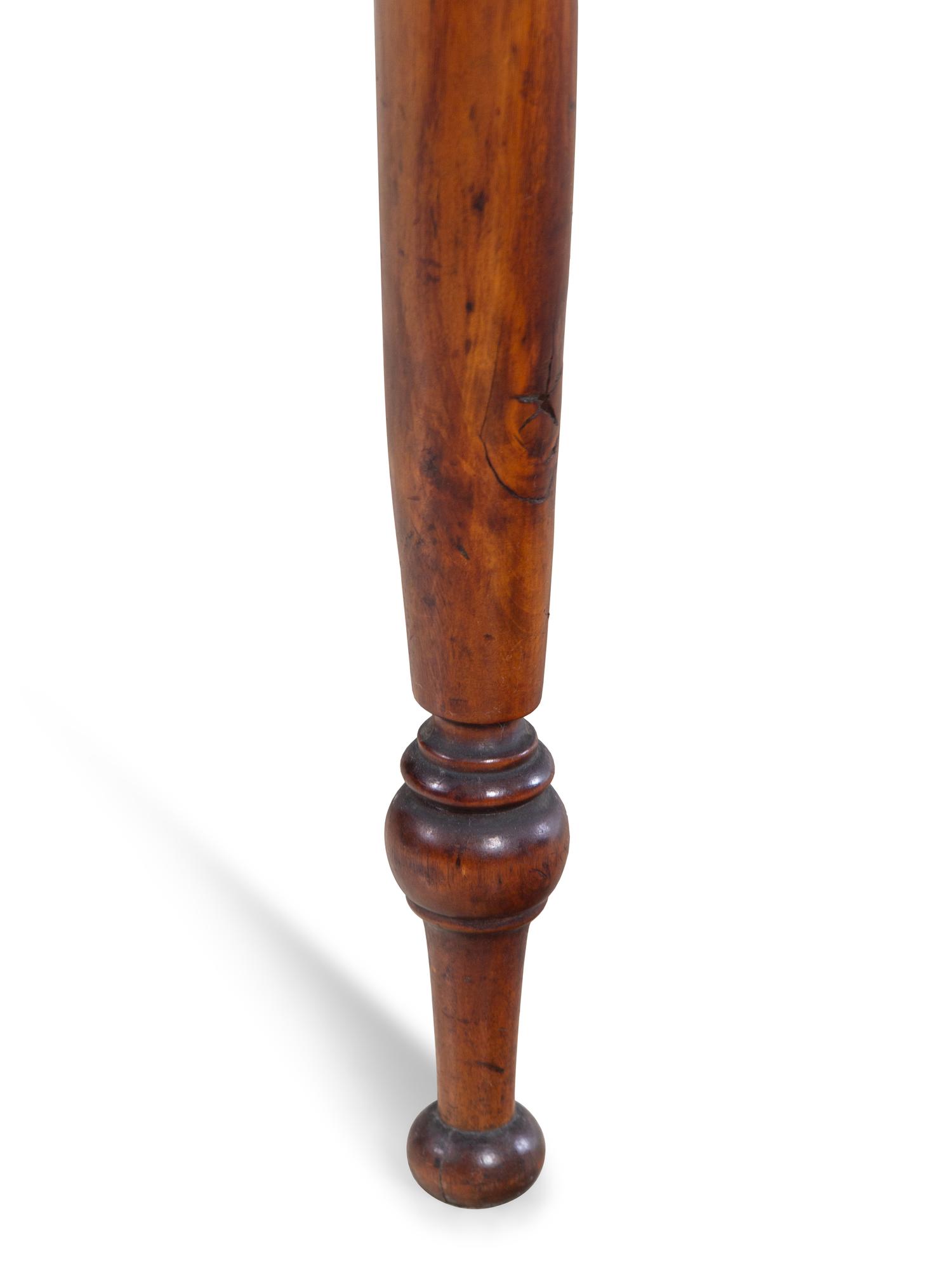 A Late Federal Cherrywood and Maple Drop Leaf Table
