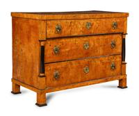 An Austrian or Northern European Parcel Ebonized Burlwood Commode