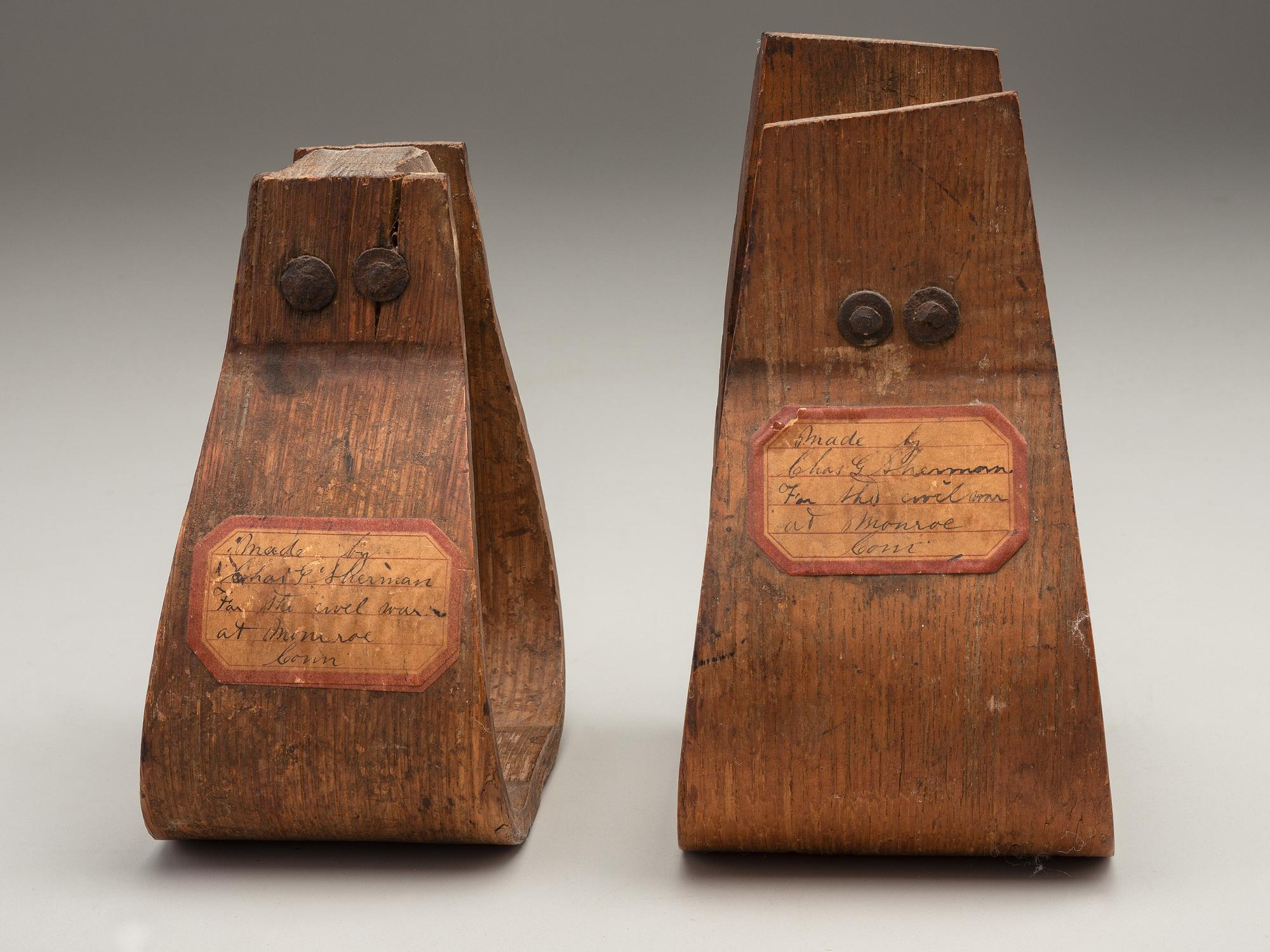 [CIVIL WAR]. Two Civil War stirrups. Made by Charles G. Sherman, Monroe, CT.