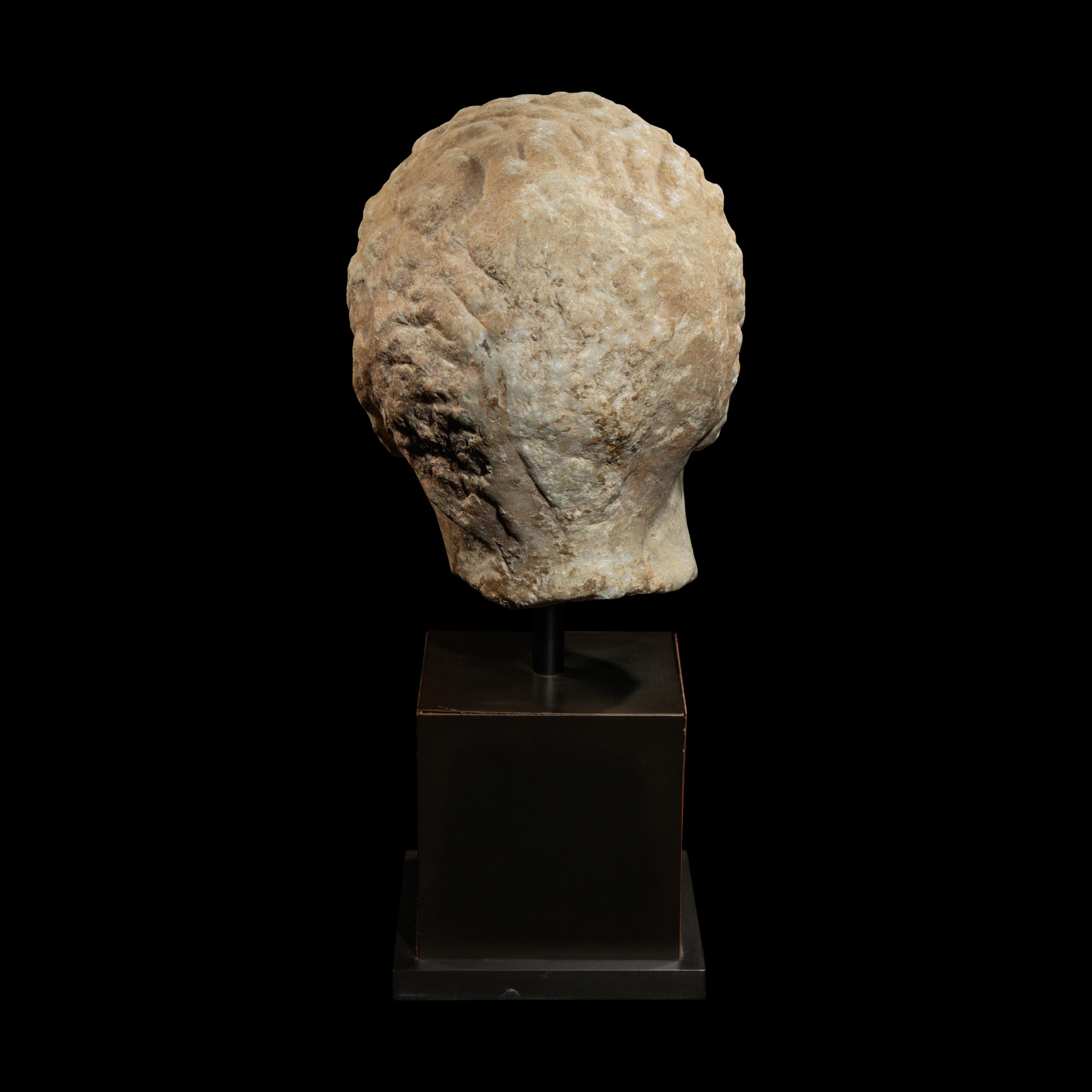 A Greek Marble Head of a Youth