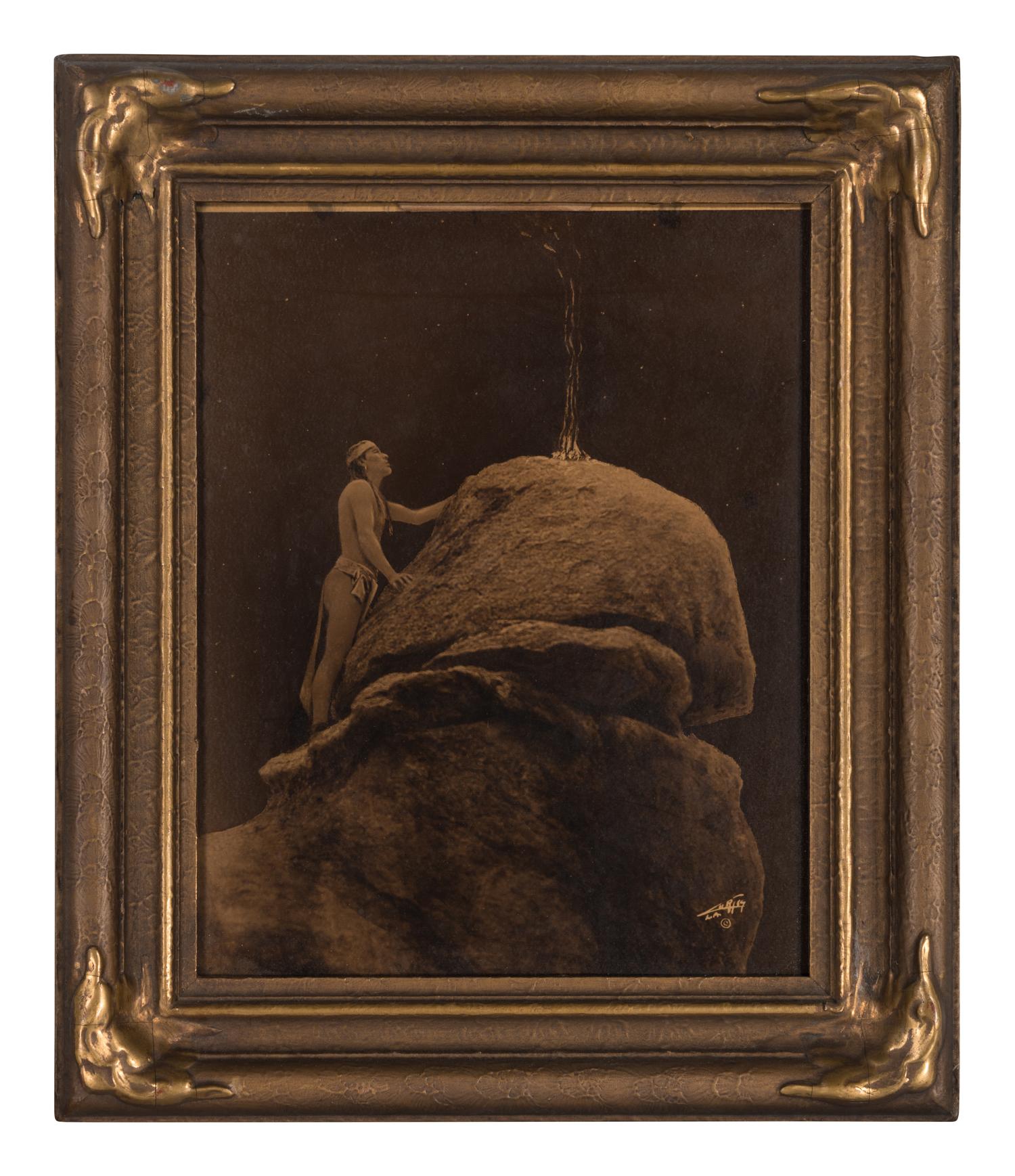 CURTIS, Edward (1868-1952), photographer. Signal Fire to the Mountain Gods. Ca 1909.