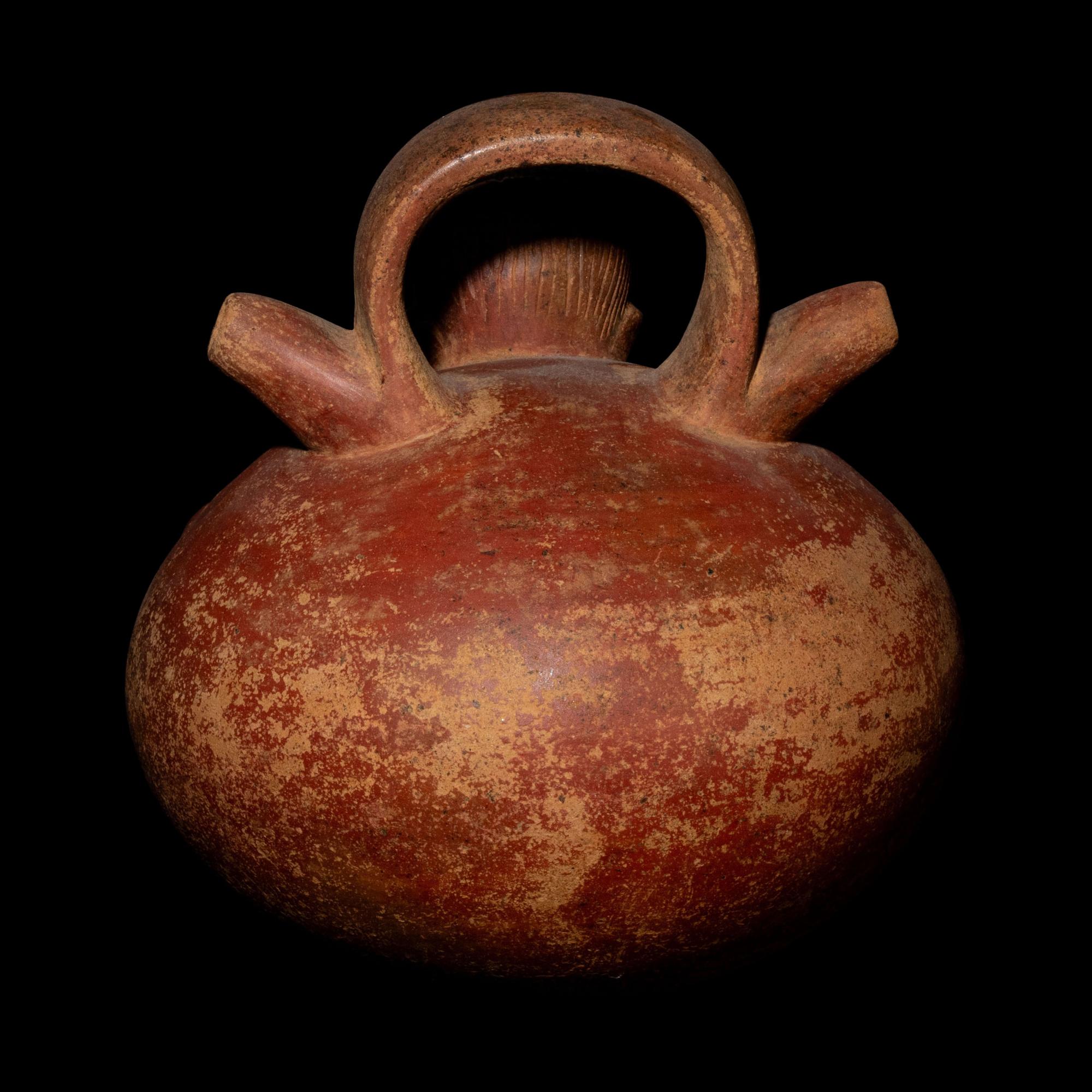 A Calima Redware Anthropomorphic Alcarraza
