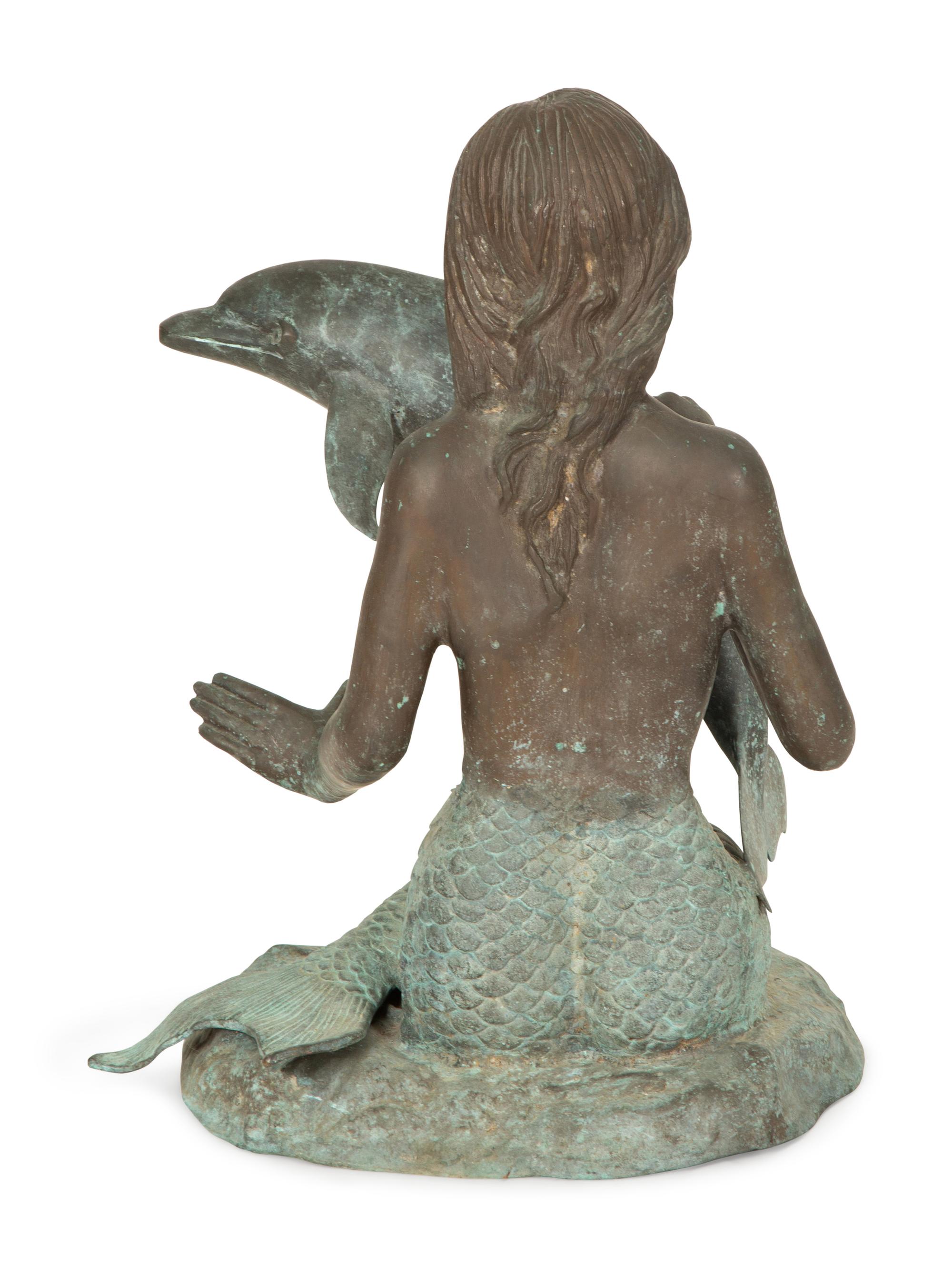 A Chinese Bronze Sculpture of a Mermaid with Dolphin