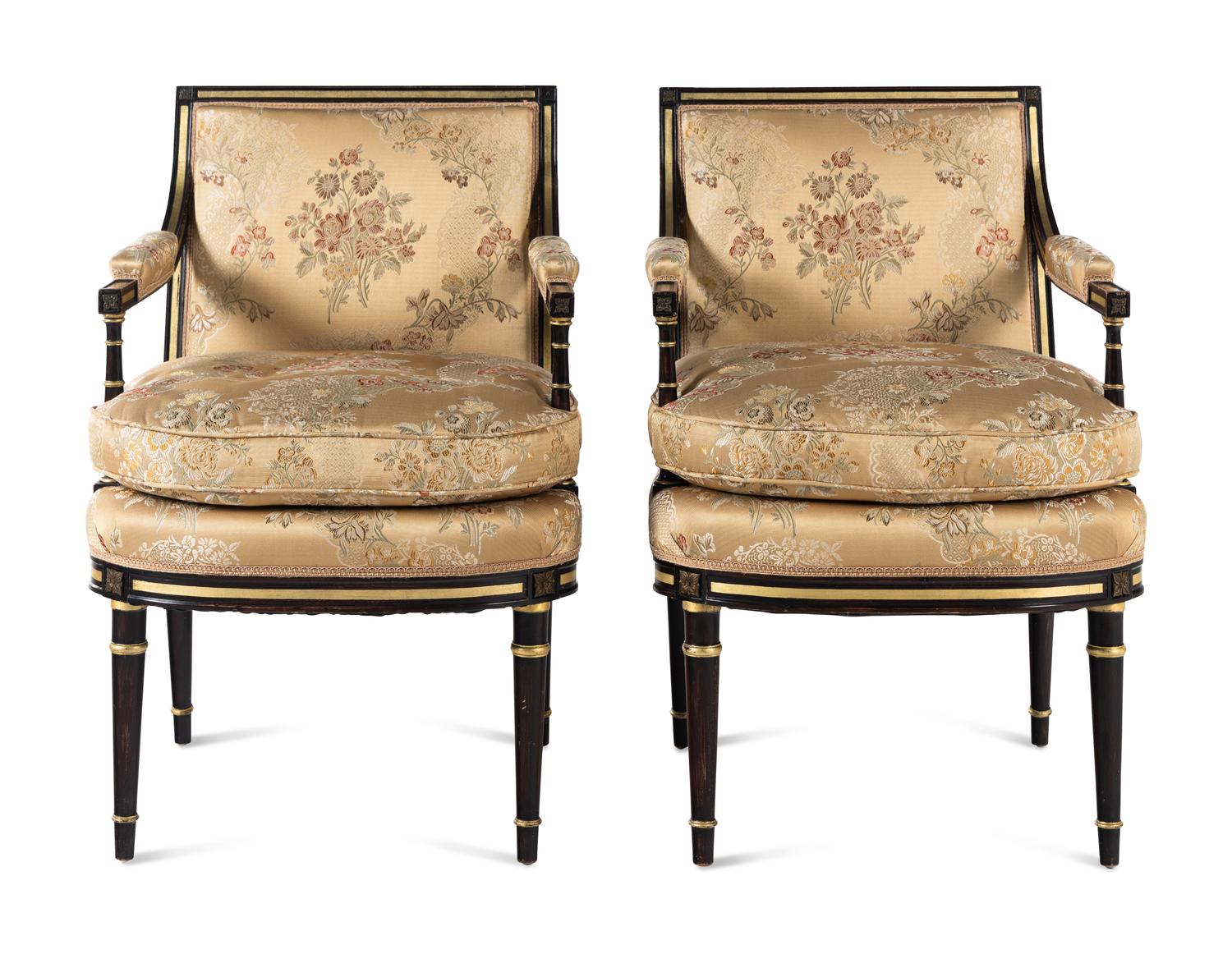 A Pair of Regency Style Painted and Parcel Gilt Armchairs