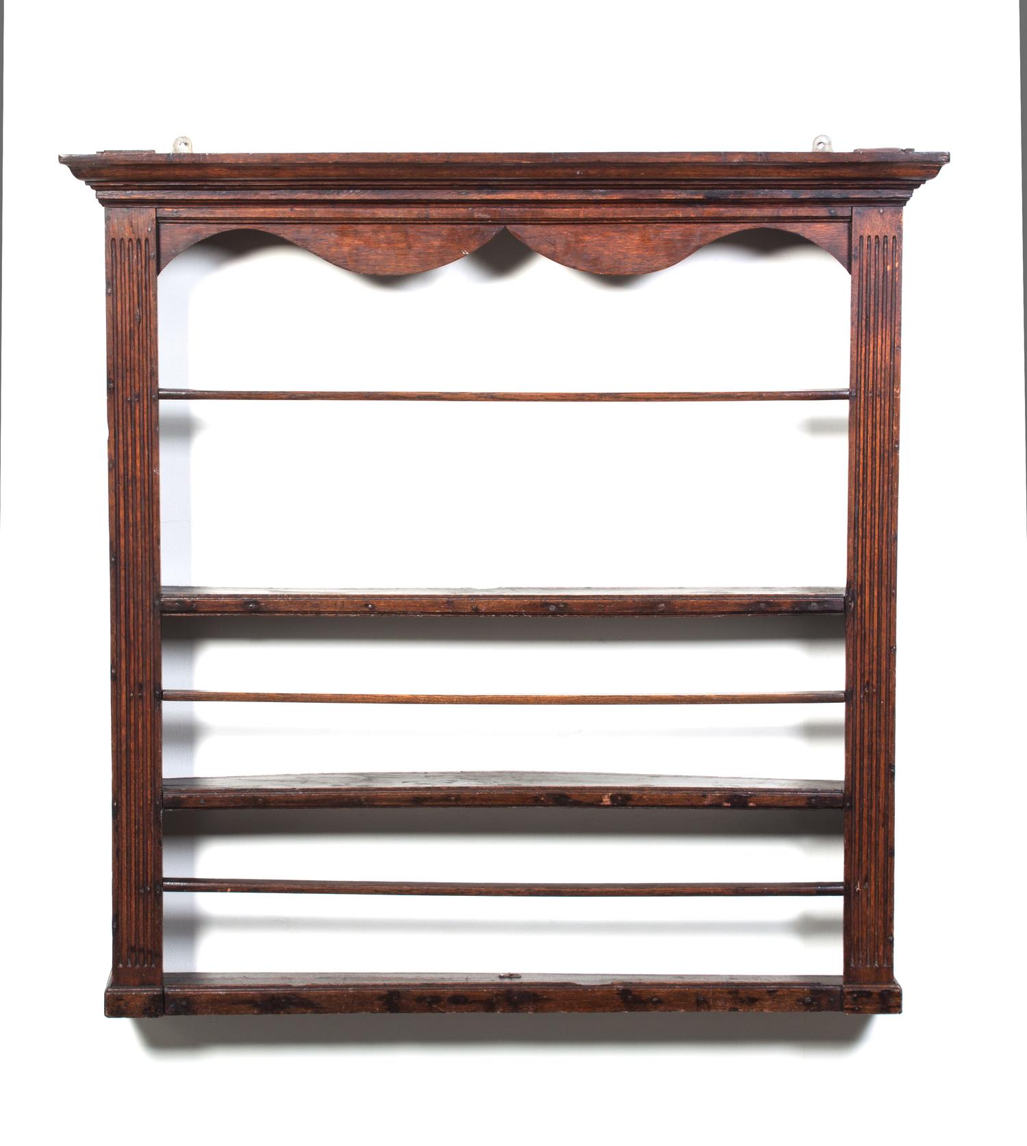 A Hanging Wall Shelf Height 42 inches.