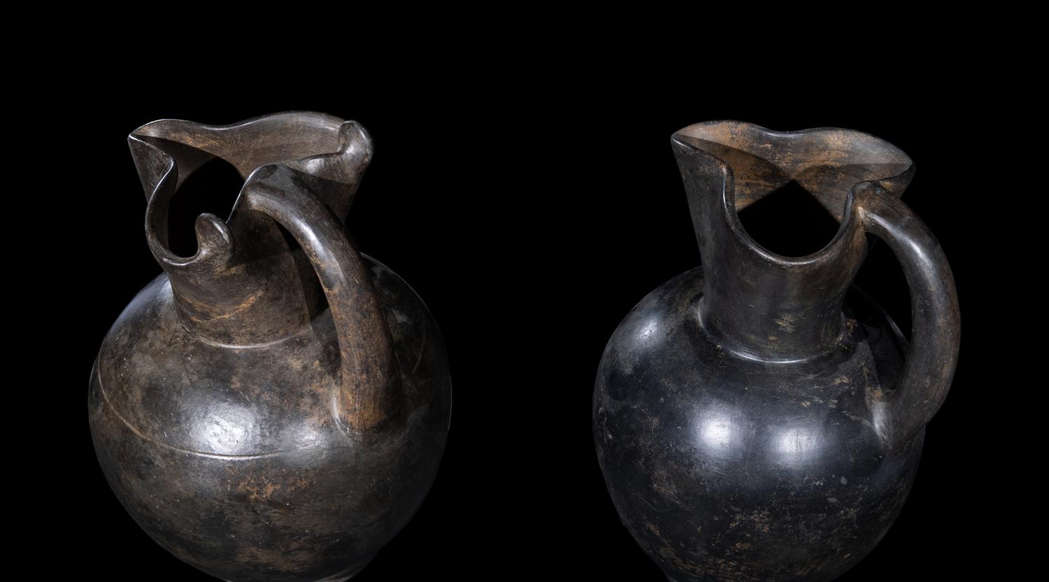 Two Etruscan Bucchero Oinochoai