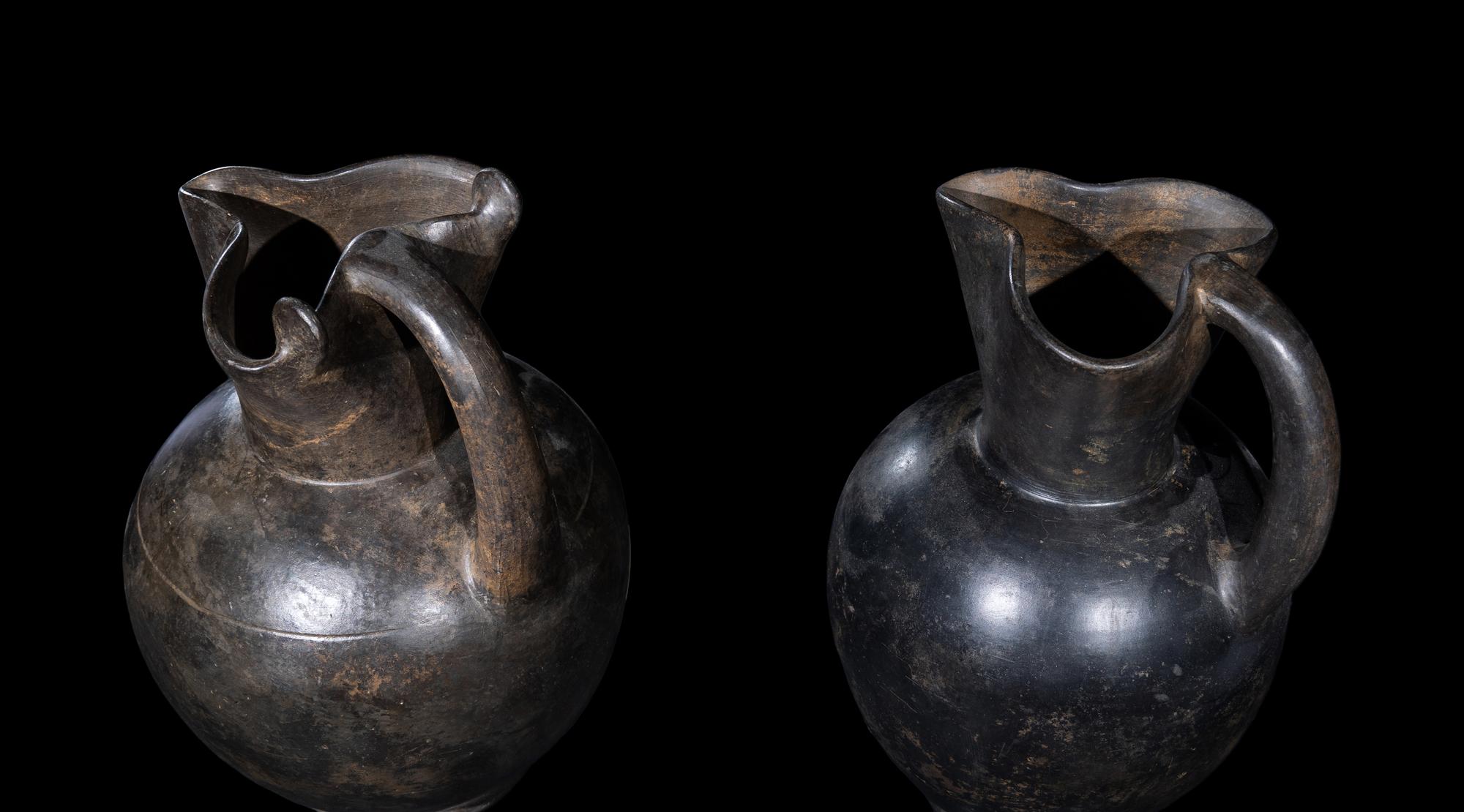 Two Etruscan Bucchero Oinochoai