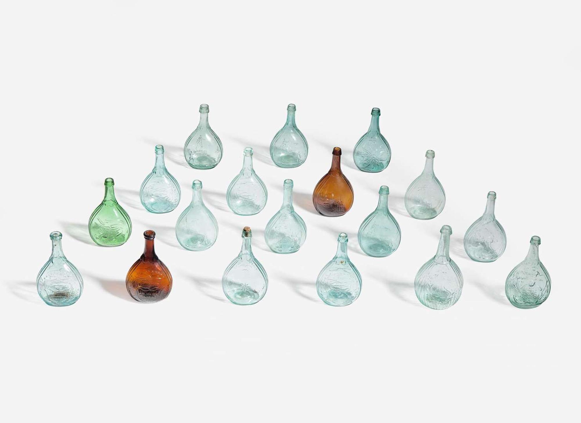 A collection of eighteen mold-blown colored glass calabash bottles, various makers, 19th century